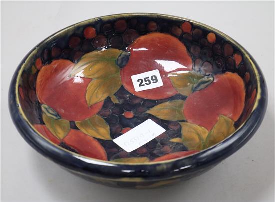 A Moorcroft pomegranate pattern bowl Diameter 26cm.